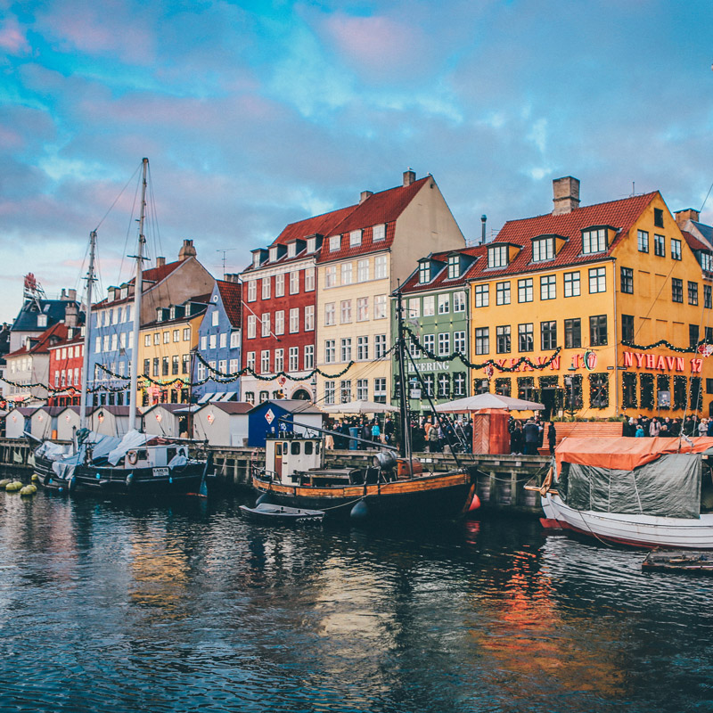 Colorful townhouses lining Nyhavn Harbor